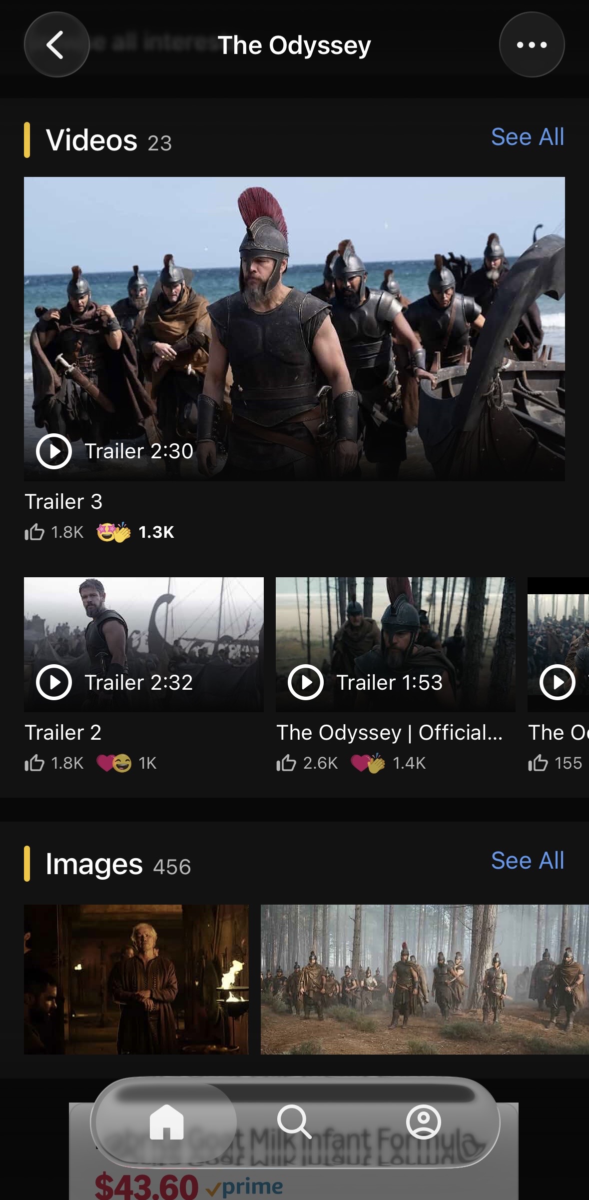 Reactions in a title's video gallery — counts appear beneath the featured trailer and beneath every video in the grid, at both card sizes
